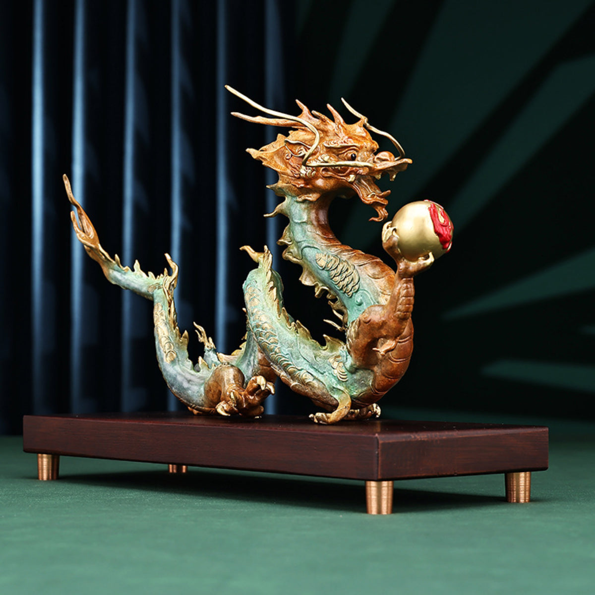 Dragon brass figurine with golden details – angled view