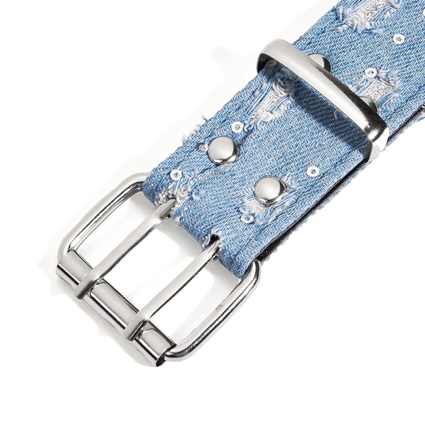Close-up of buckle and distressed details on Y2K denim studded women’s belt