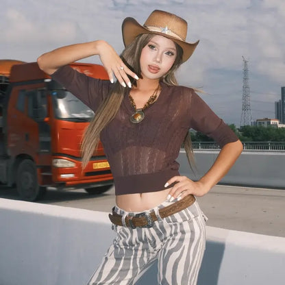 Model wearing Vintage Floral Western Belt for Women in casual cowgirl style outfit