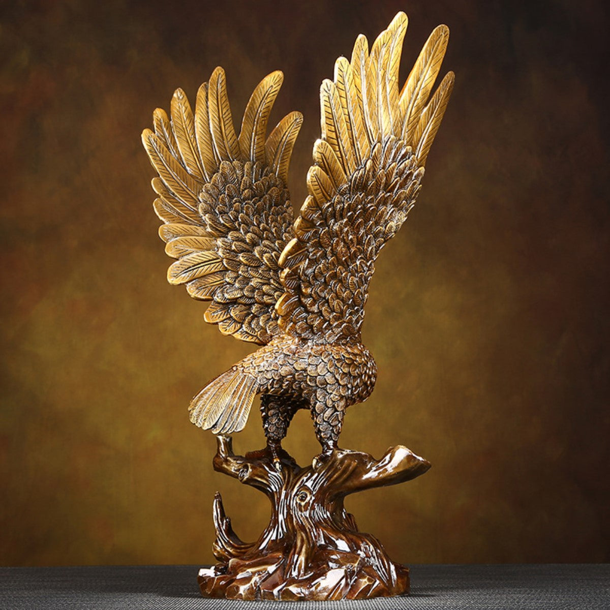 Eagle Brass figurine back view – fine feather carving