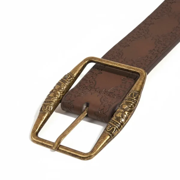 Close-up of brass buckle and embossed details on Aurora leather belt, Leather Belts collection